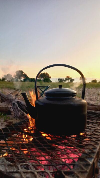 Morning coffee on the fire after a sleepout.
